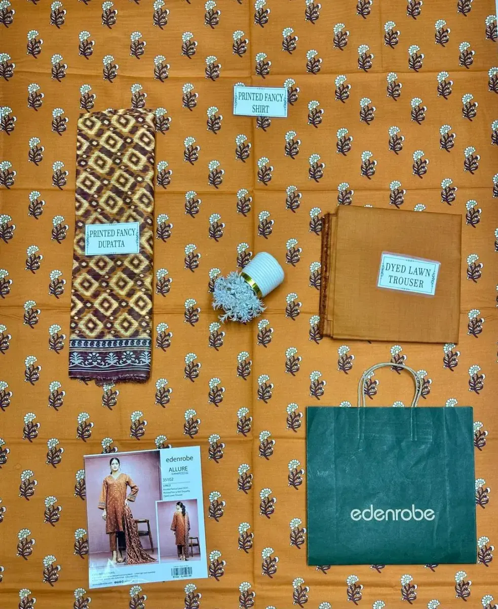 Women’s 3 Pcs Unstitched Printed Dobby Lawn Suit – Orange | Shirt, Trouser & Dupatta (3.0m / 2.5m / 2.5m)